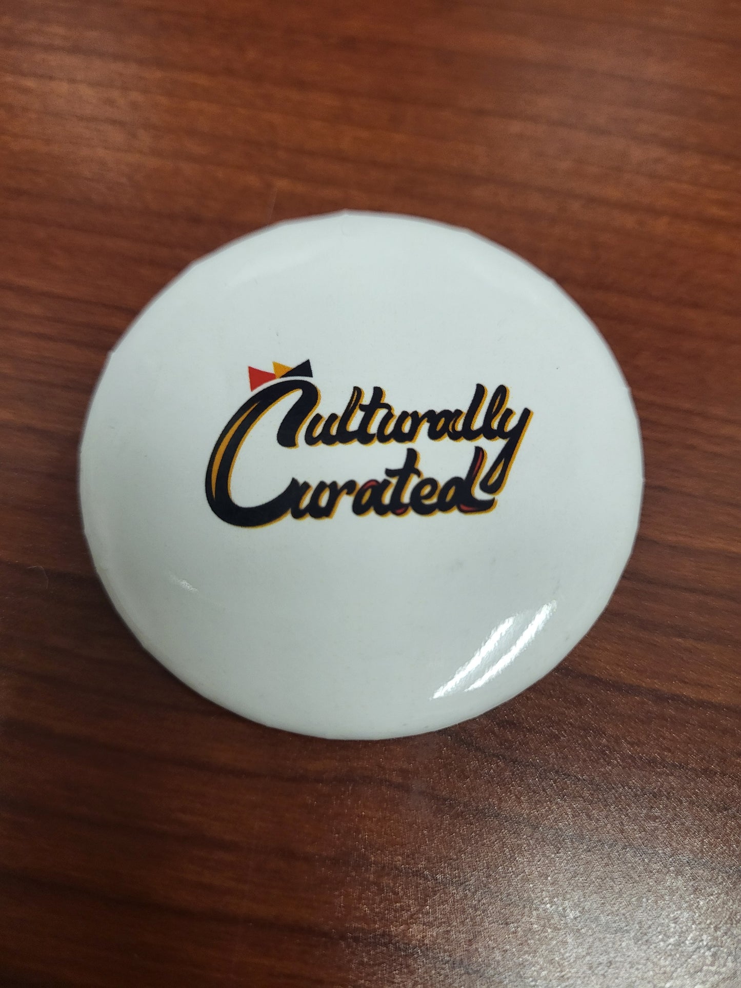 Culturally Curated Circle Button $1